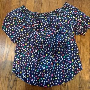 Fun and colorful off the shoulder short sleeve top. A great maternity option.